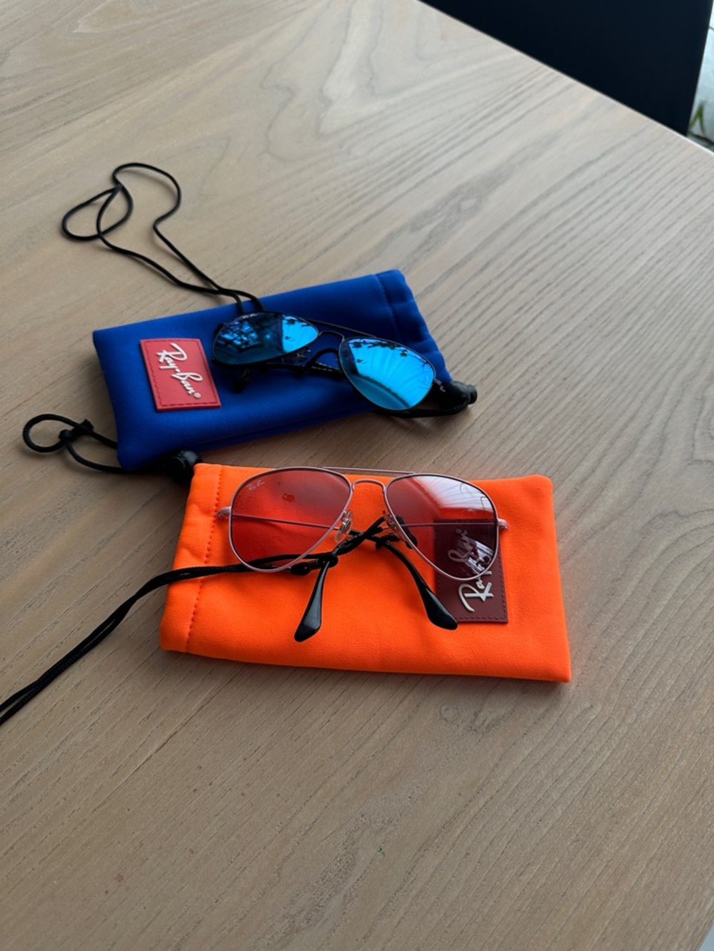 Ray-Ban Aviator Sunglasses with Orange and Blue Pouches